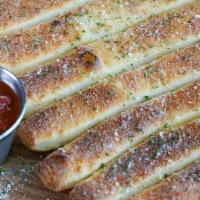Breadsticks · Handcrafted using our fresh baked dough, sliced into approx 10 pcs, topped with garlic butte...