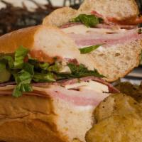 Italian Combo · Premium sliced ham, turkey, salami, american cheese, romaine lettuce, roma tomatoes, mayo, i...
