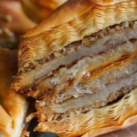 Mama'S Baklava · Authentic Mediterranean pastry with a double layer of crispy, buttery phyllo dough, chopped ...