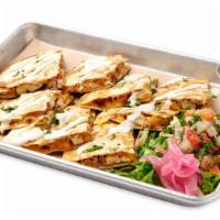 Bacon Ranch Quesadilla · Melted between Mixed Cheeses and served with Avocado Cream and a side of Ranch. Topped with ...