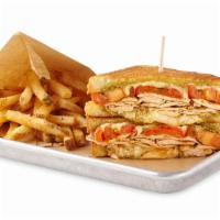 Pesto Chicken Melt · Grilled Chicken, Herb Roasted Tomatoes, Pesto Sauce with Fontina and Jack Cheese on toasted ...