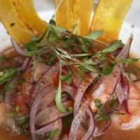 Ecuadorian Shrimp Ceviche · 4 jumbo shrimp, fresh lime, lemon & orange juice, cilantro, espelette, jalapeño, red onion, ...