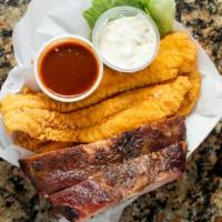 Toe Cee Deaux · Texas Surf and Turf 1 Golden fried piece of Fish and one rib served with 1 side of your choi...