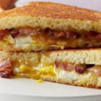 Bacon Egg And Cheese Sandwich · Bacon egg and cheese sandwich on white bread
