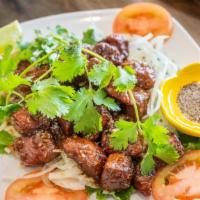 Shaken Beef / Bo Luc Lac · Tender buttery beef cubes cooked over a high flame with lemongrass, onions, and garlic spice...