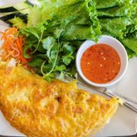 The Savory Crepe / Banh Xeo · Crispy crunchy savory crepe made from rice and turmeric flours stuffed with soft mung bean, ...