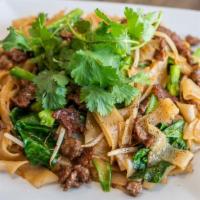 Beef Stir-Fried Rice Noodles / Hu Tieu Xao Bo · Thin rice noodles stir-fried with beef, Napa cabbage, celery, carrots, broccoli, and onions ...