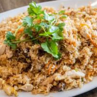 Chicken Fried Rice / Com Chien Ga · Garlic fried jasmine rice with chicken, carrot strips, egg, scallions, and onions.