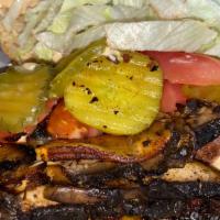 Grilled Mushroom Po Boy · Seasoned with traditional creole seasonings, this portobellos sandwich is incredible, pared ...