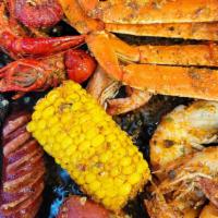 Cb Combo · Mussels, snow crab, 1 lb crawfish, shrimp, sausage (1 piece), potatoes and corn.