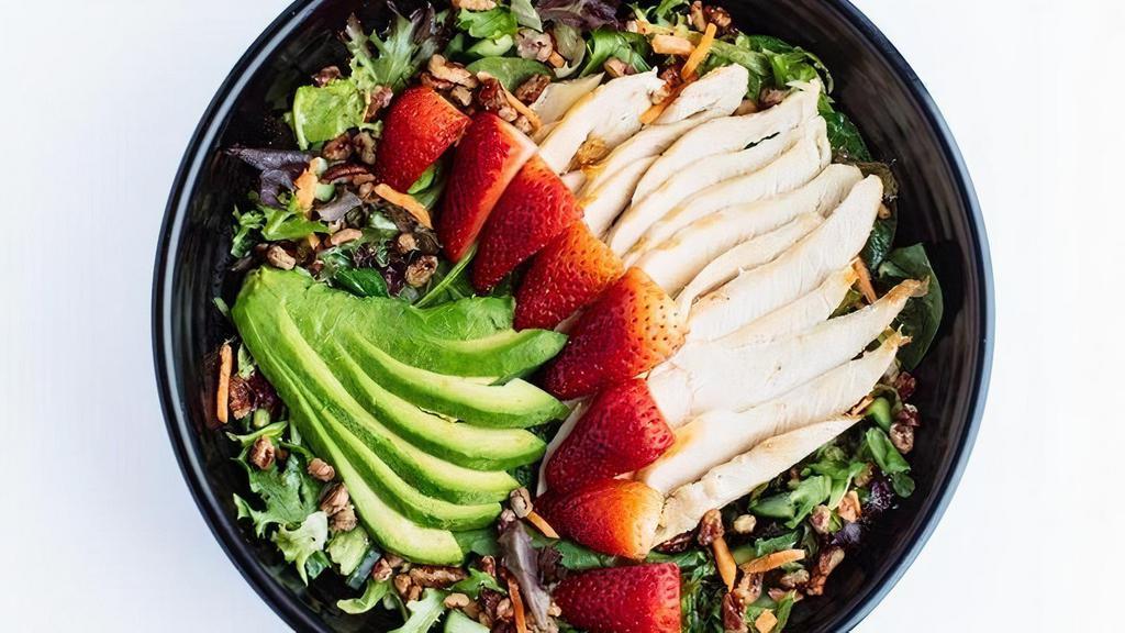 Ichigo Salad · A Spring Mix and Spinach Salad tossed with Carrots, Cucumber and our Homemade Poppy Seed Dressing topped with White Chicken, Fresh Strawberries, Avocado and Sweet Pecans.