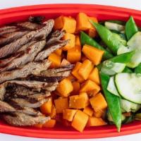 Them Gainz · A protein packed meal loaded with steak,. sweet potato snap peas, zucchini and. spinach. Ser...