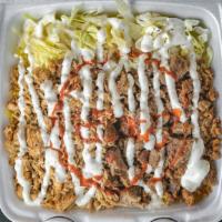 Mix Over Rice (Lamb & Chicken) · Lamb/Beef & chicken over rice topped with  house special white sauce and Hot sauce.