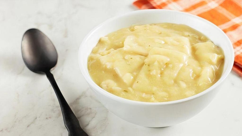 Chicken And Dumplings · Old-fashioned style dumplings and white meat chicken in a rich, savory broth.