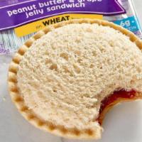Kid'S Smucker’S® Uncrustables® Pb&J · Grape jelly and peanut butter on crust-less wheat bread.