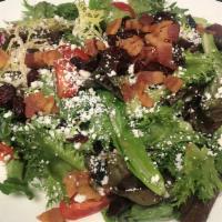 Uncork'D House Salad · Spring mix topped with grape tomatoes, bacon, cranberries & goat cheese crumbles.  Tossed in...