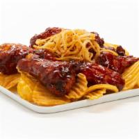 Smoky Bbq Chicken Wings · Crispy bone-in wings tossed in our signature Smoky BBQ sauce, topped with crispy onion straw...