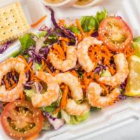 Shrimp Salad · Fresh boiled shrimp on a garden salad of mixed leaf lettuce, carrots, red cabbage, tomato, a...
