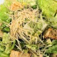 Caesar Salad · Scratch-made dressing with anchovy, lemon, and garlic tossed with crisp romaine lettuce, fre...