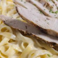 Chicken Fettuccine Alfredo · Fresh cream, butter, and parmesan cheese tossed with grilled chicken and fettuccine.