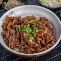 Beef Gyu-Don · Beef and onion over rice, served with miso soup, salad, bean sprouts side, pickled radish.