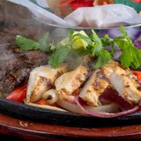 Beef & Chicken Fajitas · Tender strips of beef & chicken fajita marinated in our special sauce & grilled to perfectio...
