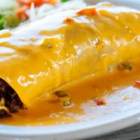 El Jefe Burrito · Our homemade large flour tortilla filled with refried beans, ground beef or chicken ranchero...