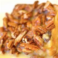 White Chocolate Bread Pudding · Homemade bread pudding with succulent white chocolate rum icing over the top.