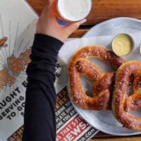 Slow-Dough Big Soft Pretzel · Buttered, toasted, and salted and served choice of two dipping sauces: cream cheese and chiv...