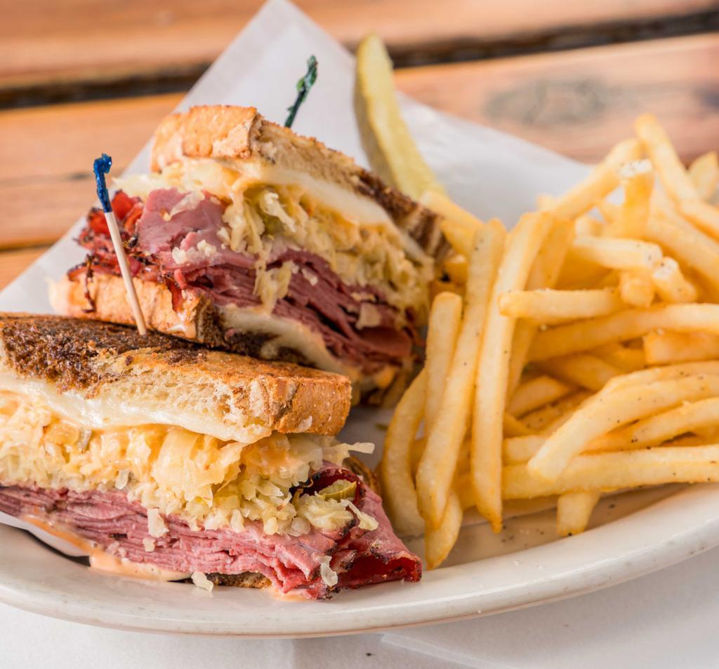 Reuben-Esque · Hot pastrami, jalapeno sauerkraut, melted Swiss cheese, and Russian dressing on toasted marble rye bread.