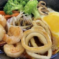 Day By The Seaside · Fesh squid &j jumbo shrimps and scallops served with Japanese terriyaki sauce.