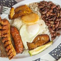 Bandeja Paisa · Typical Colombian dish. Comes with pork belly, beef skirt, Colombian sausage, rice and beans...