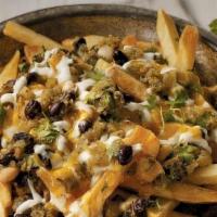 Green Chile Rajas Queso Fries · Large to go box filled with fresh natural cut up fries, nacho chesse, anaheim,chile californ...