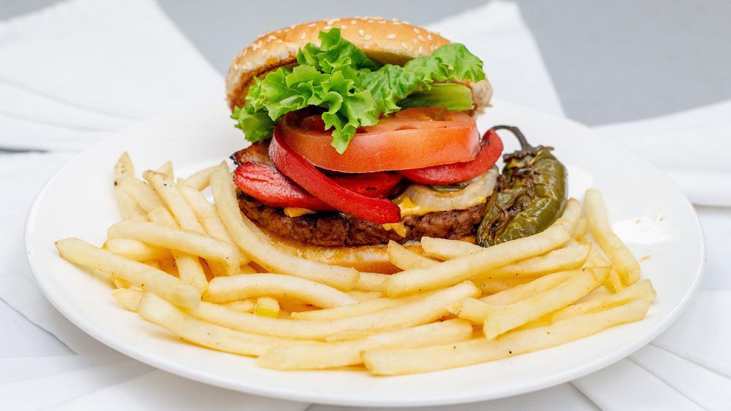 Juarez Style Burger With Fries · GRILLED SIRLOIN Burger with ham, winnie, white cheese, yellow cheese, grilled onions, grilled jalapeno, lettuce, tomato, ketchup,mayonnaise, mustard AND order of fries.