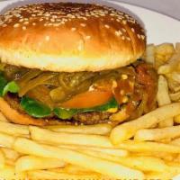 Green Chile Rajas Con Queso Burger With Fries. · GRILLED SIRLOIN Burger with rajas con queso white and yellow slices, lettuce tomato, ketchup...