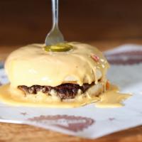 Stick A Fork In Me Burger · Burger Patty, Smothered in our Housemade Queso.  Queso on the side when ordered to go.