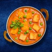 Mutter Paneer · Fresh cottage cheese and peas cooked with herbs and spices
