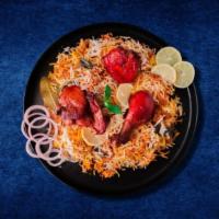 Tandoori Chicken Biryani · Bone-in spring chicken seasoned in a yogurt tandoori marinade, skewered and grilled in a tra...