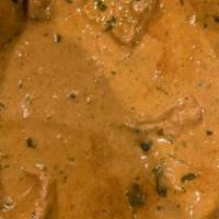 Chicken Curry · Boneless chicken cooked in ground spices.