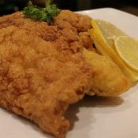 Fried Catfish Filets (3 Pieces) · Golden fried catfish fillets with your choice of one side.