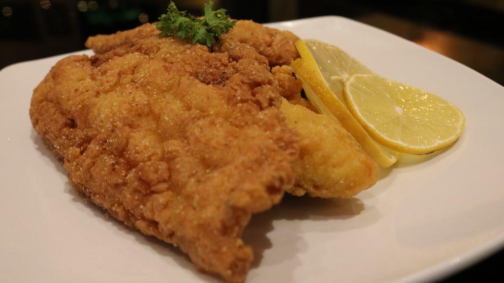 Fried Catfish Filets (3 Pieces) · Golden fried catfish fillets with your choice of one side.