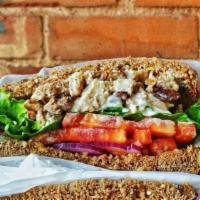 Louisville Chicken Salad  · Chicken, seasoned mayonnaise, sweet and spicy pecans, lettuce, tomato, red onion, salt and p...