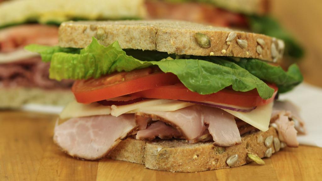 The Classic Sandwich  · Your choice of meats, cheese and bread with lettuce, tomato, red onion, salt and pepper, mayonnaise and dijon mustard. Meats: Turkey, Ham, Chicken or Roast Beef Cheeses: Cheddar, Swiss, Pepper Jack, or Provolone.