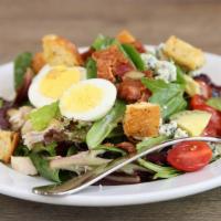 The Cobb  · Mixed greens, chicken, bacon, hard boiled eggs, cherry tomatoes, avocado, blue cheese and cr...