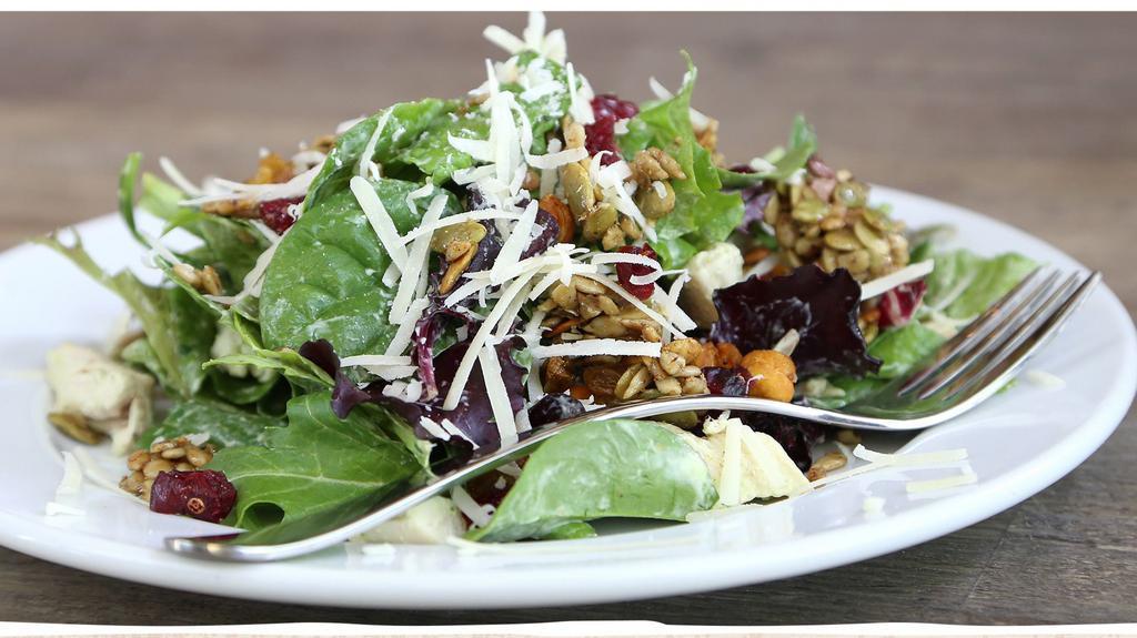 The Yardbird  · Mixed greens, chicken, roasted seeds and nuts, roasted chickpeas, golden raisins and Parmesan cheese topped with avocado goddess dressing.