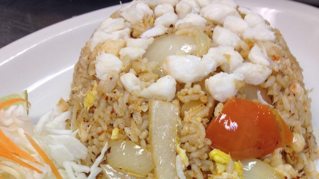 Crab Meat Fried Rice · Fried rice with egg, crab meat, onions and tomatoes.