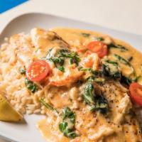 Redfish Pontchartrain · Seared Red Fish fillet topped with our Louisiana Pontchartrain sauce with mushrooms, crawfis...