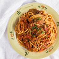 Spaghetti Meatballs · Spaghetti pasta with meatballs, fresh basil, garlic, grated parmesan, and tomato sauce.