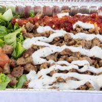 Combo Plates · Rice, lamb and chicken, lettuce, tomato, cucumber, red onion, pickle, feta cheese, white and...