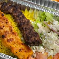 Beef Kabab Plate · Two skewers lamb or beef kabab, rice, lettuce, tomatoes, cucumber, pickles, feta cheese, dre...